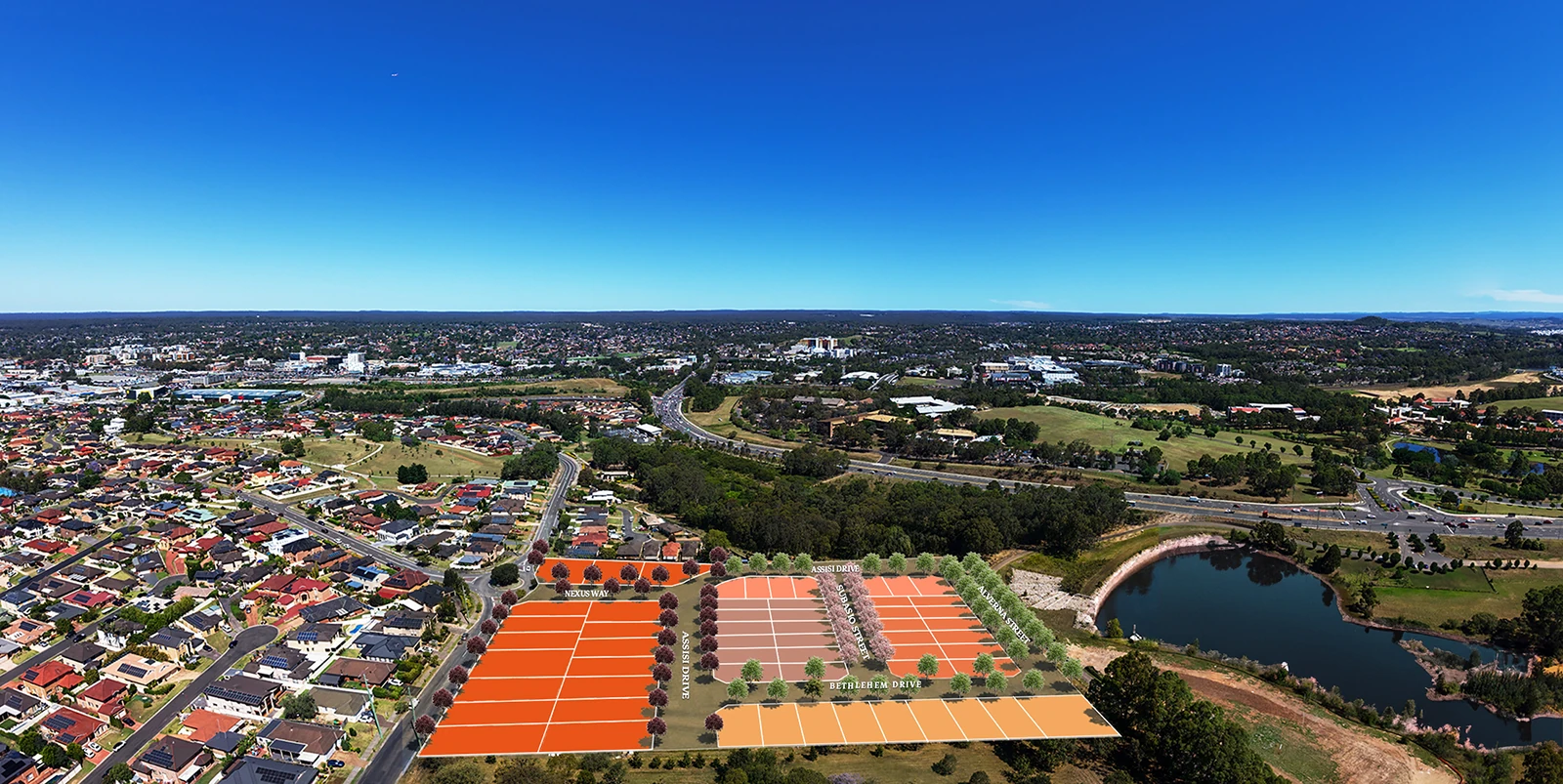 Aerial view of a suburban area showcasing a large vacant plot—marked with orange and beige sections—highlighting a new land release in Cambelltown, surrounded by roads, houses, and a nearby pond.